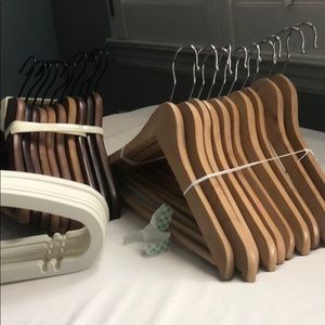 Wooden hangers . Sets of ten.